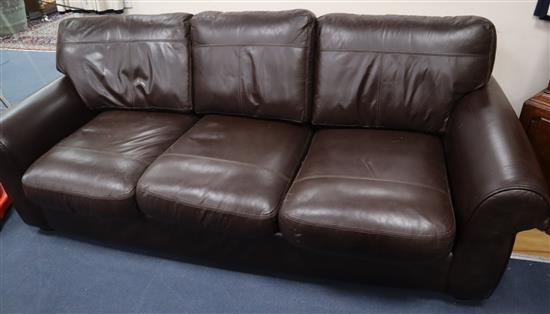 A John Lewis brown leather three seater sofa W.210cm